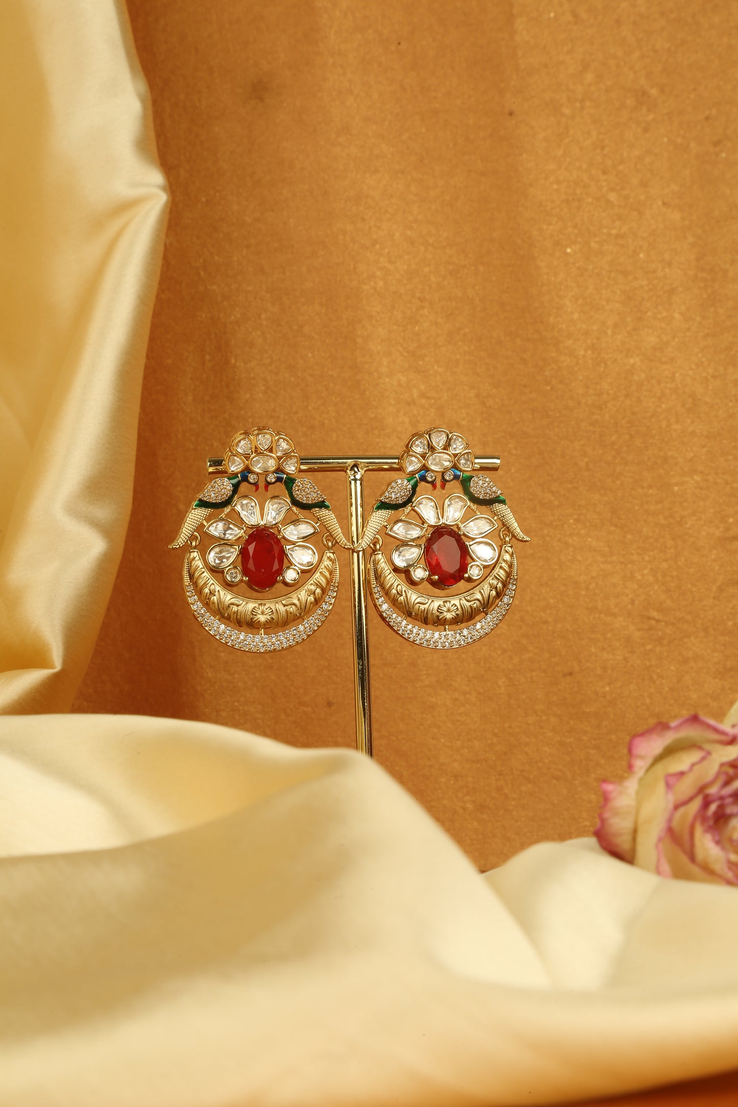 Gold peacock earrings